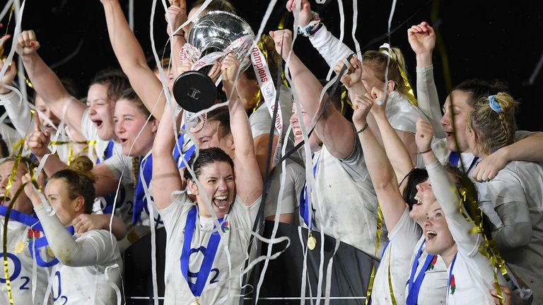 Sarah Hunter of England lifts the trophy as the England team celebrate becoming Grand Slam Champions following the Women's Six Nations match between England Women and Scotland Women at Twickenham Stadium on March 16, 2019 in London, England. 