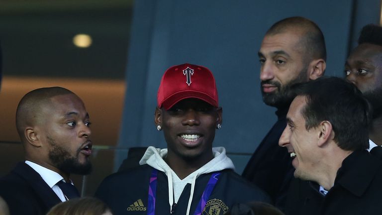Patrice Evra (left) attended Manchester United's win over PSG in Paris this month
