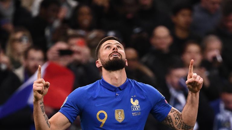 Olivier Giroud celebrates after scoring for France in their win over Iceland.