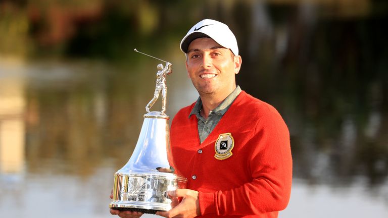 Francesco Molinari with the trophy after winning the Arnold Palmer Invitational