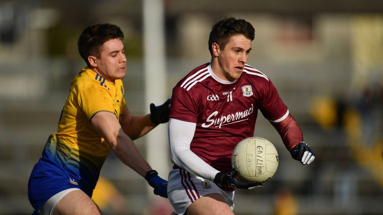 Shane Walsh is chased by Conor Daly