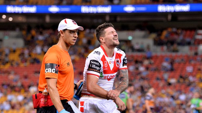 Gareth Widdop leaves the field after he was injured in an NRL round 3 match