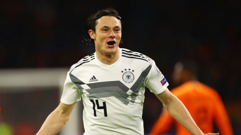 Nico Schulz celebrates his late winner over the Netherlands