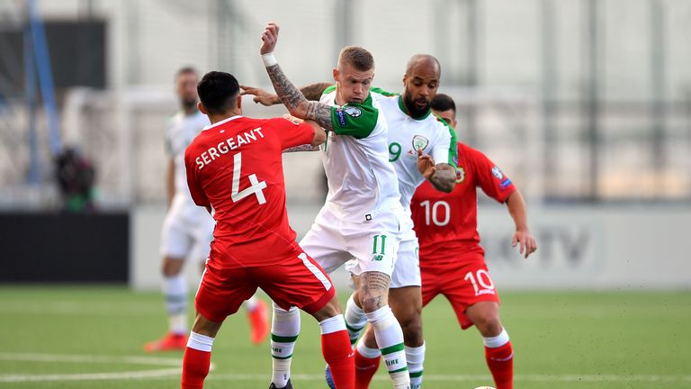 Gibraltar&#39;s John Sergeant (left) and Republic of Ireland&#39;s James McClean (second left) battle for the ball during the UEFA Euro 2020 Qualifying, Group D match at the Victoria Stadium, Gibraltar.