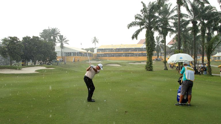 Scott Hend of Australia plays his third shot on the 18th hole during day four of the Maybank Championship