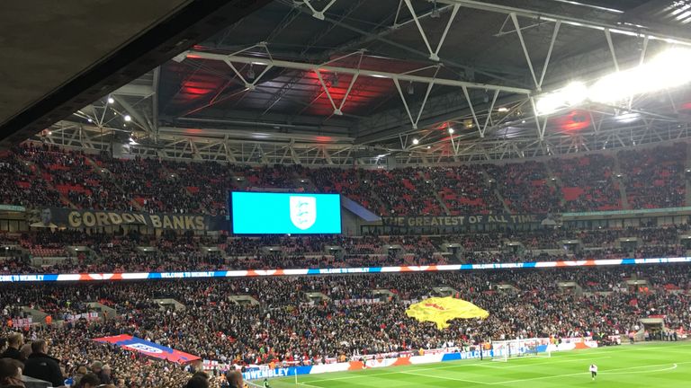 A banner reading 'Gordon Banks. The Greatest of all time' is seen at Wembley 