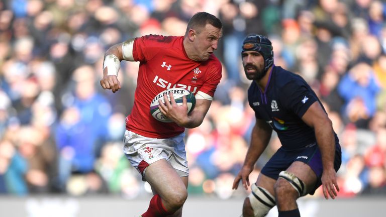 Hadleigh Parkes carries the ball in Wales' victory over Scotland