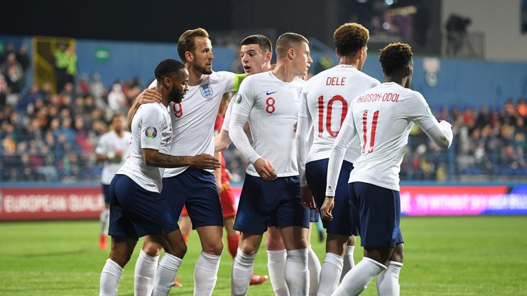 Ross Barkley celebrates scoring England's third goal with team-mates