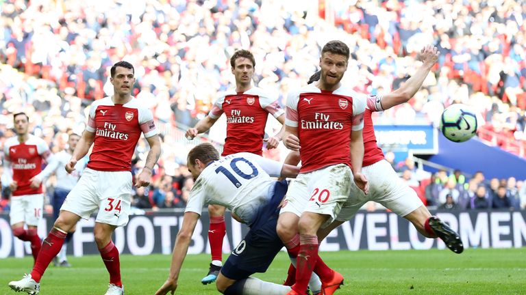 Harry Kane is fouled by Shkodran Mustafi resulting in a penalty for Tottenham