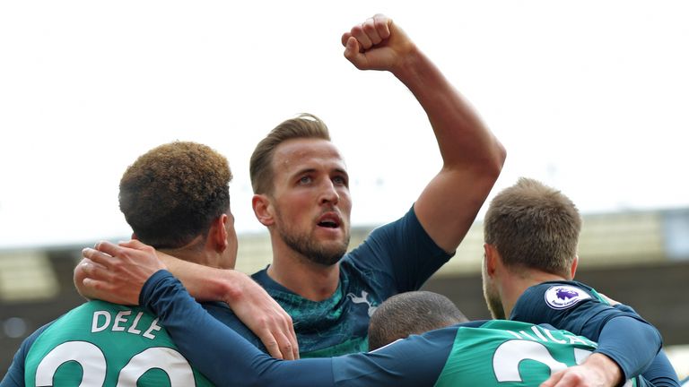 Harry Kane celebrates with team-mates after putting Tottenham ahead