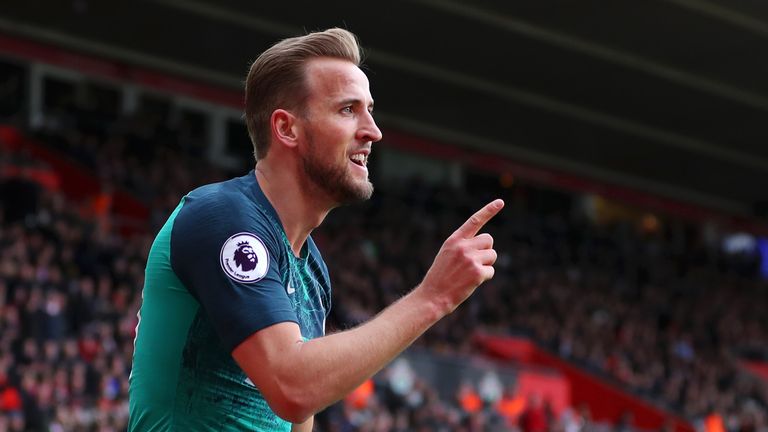 Harry Kane celebrates scoring the opening goal of the game