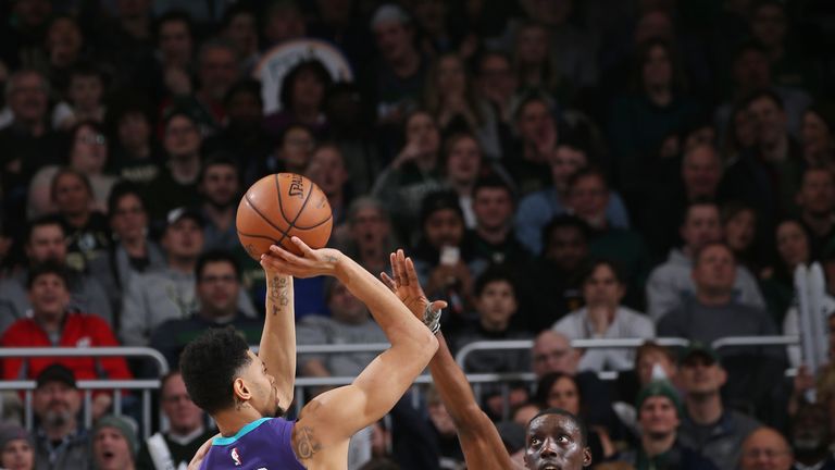 MILWAUKEE, WI - MARCH 9: Jeremy Lamb #3 of the Charlotte Hornets shoots the ball against the Milwaukee Bucks  on March  9, 2019 at the Fiserv Forum Center in Milwaukee, Wisconsin. NOTE TO USER: User expressly acknowledges and agrees that, by downloading and or using this Photograph, user is consenting to the terms and conditions of the Getty Images License Agreement. Mandatory Copyright Notice: Copyright 2019 NBAE (Photo by Gary Dineen/NBAE via Getty Images). 