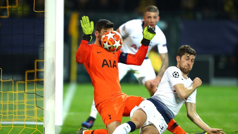 Hugo Lloris and Ben Davies block a Borussia Dortmund shot during Tottenham's Champions League tie