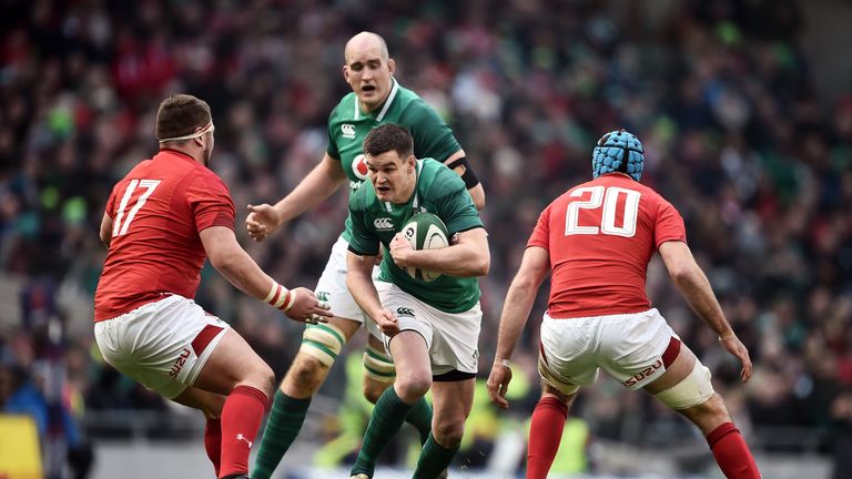 Johnny Sexton of Ireland and Justin Tipuric and Wyn Jones of Wales during the Six Nations Championship rugby match between Ireland and Wales at Aviva Stadium on February 24, 2018 in Dublin, Ireland. (Photo by Charles McQuillan/Getty Images)