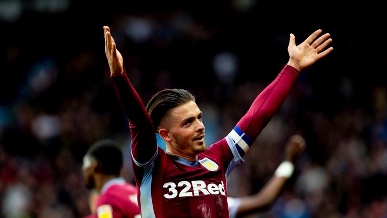 Jack Grealish celebrates after scoring on his return from injury