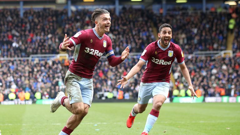 Aston Villa's Jack Grealish (left) celebrates scoring his sides first goal of the game during the Sky Bet Championship match at St Andrew's Trillion Trophy Stadium, Birmingham.