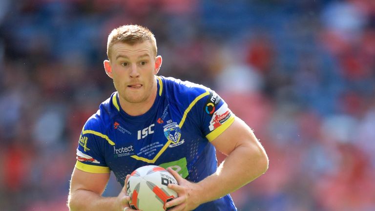 Jack Hughes in action for Warrington Wolves in 2018 Challenge Cup final