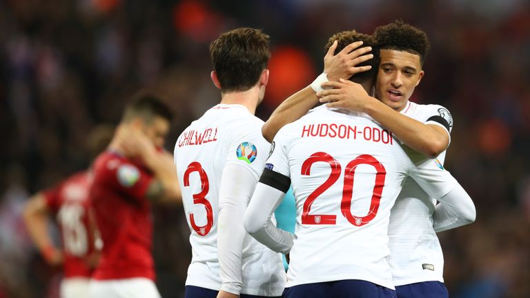 Jadon Sancho embraces Callum Hudson-Odoi after the fifth goal