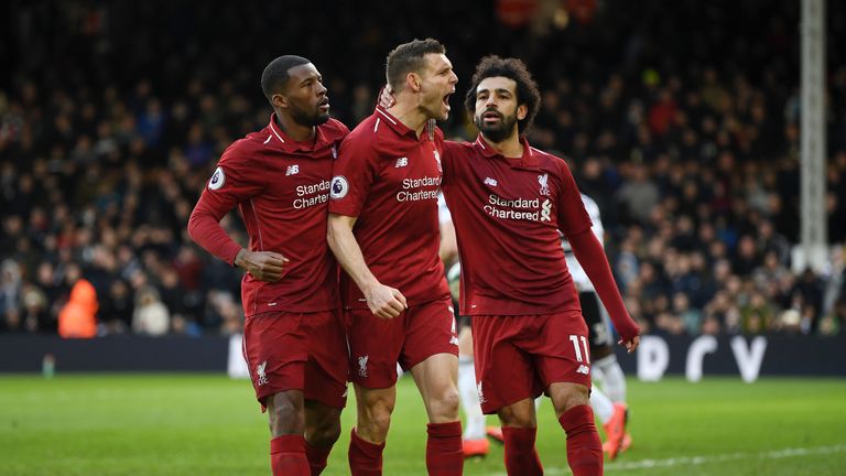 James Milner celebrates scoring his penalty for Liverpool late on against Fulham