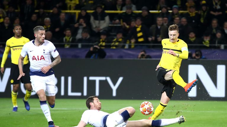 Jan Vertonghen blocks a shot by Marco Reus in Tottenham's Champions League tie away to Borussia Dortmund
