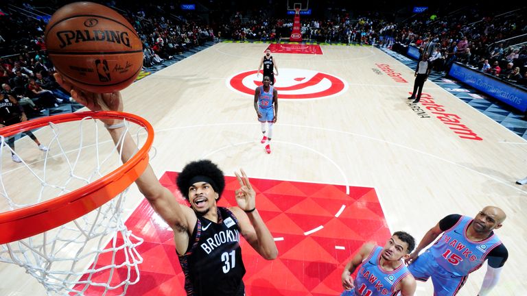 Jarrett Allen #31 of the Brooklyn Nets dunks the ball against the Atlanta Hawks on March 9, 2019 at State Farm Arena in Atlanta, Georgia.