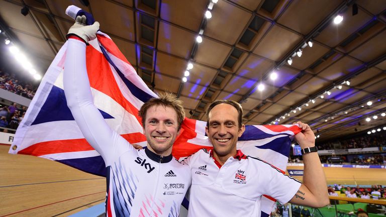 Jason Kenny of Great Britain celebrates with coach Justin Grace