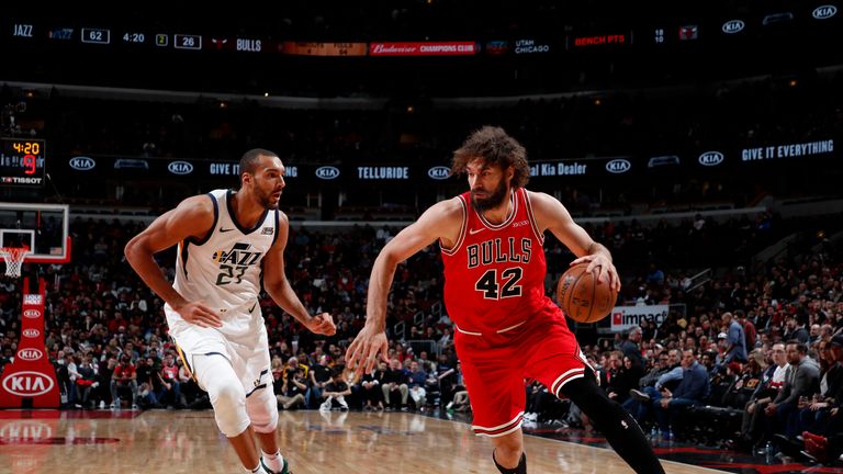 CHICAGO, IL - MARCH 23: Robin Lopez #42 of the Chicago Bulls handles the ball against the Utah Jazz on March 23, 2019 at United Center in Chicago, Illinois. NOTE TO USER: User expressly acknowledges and agrees that, by downloading and or using this photograph, User is consenting to the terms and conditions of the Getty Images License Agreement. Mandatory Copyright Notice: Copyright 2019 NBAE (Photo by Jeff Haynes/NBAE via Getty Images).