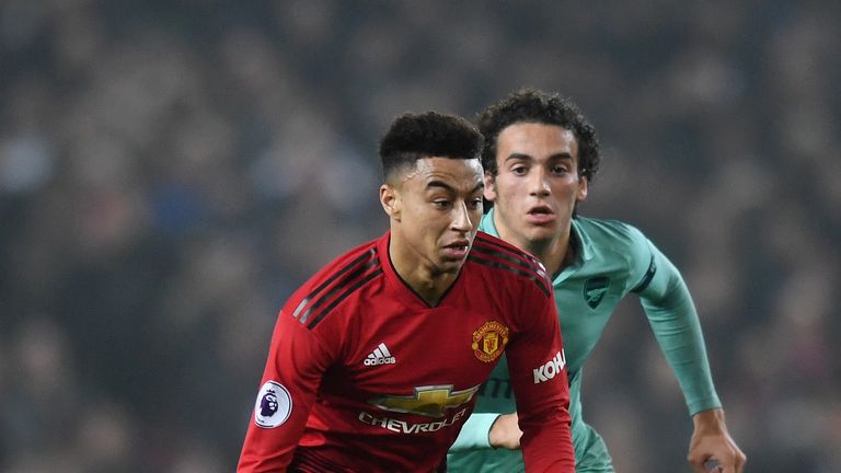 Jesse Lingard and Matteo Guendouzi during the Premier League match between Manchester United and Arsenal FC at Old Trafford on December 5, 2018 in Manchester, United Kingdom.