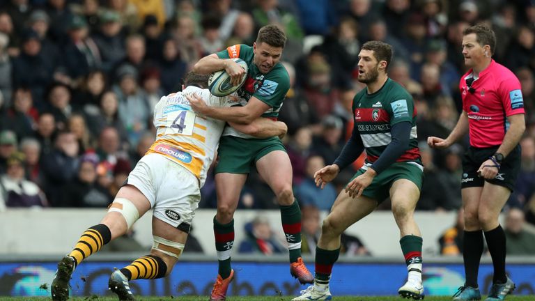 Joe Ford of Leicester is tackled by Will Rowlands