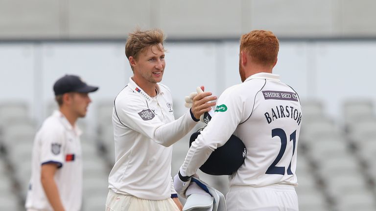 Joe Root and Jonny Bairstow of Yorkshire during the Specsavers Championship Division One match between Lancashire and Yorkshire at Old Trafford on July 24, 2018 in Manchester, England.