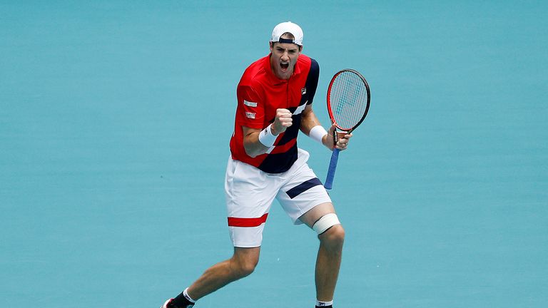 John Isner of the United States reacts during his match against Albert Ramos Vinolas of Spain during Day 7 of the Miami Open Presented by Itau at Hard Rock Stadium on March 24, 2019 in Miami Gardens, Florida