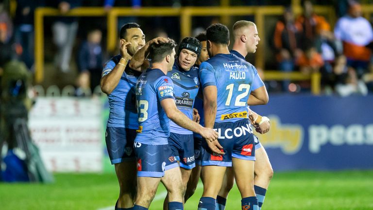 St Helens's Jonny Lomax is congratulated on his try against Castleford