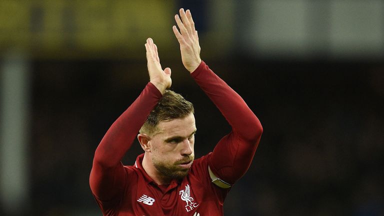 Liverpool&#39;s English midfielder Jordan Henderson applauds the fans after drawing the English Premier League football match between Everton and Liverpool at Goodison Park in Liverpool, north west England on March 3, 2019. 