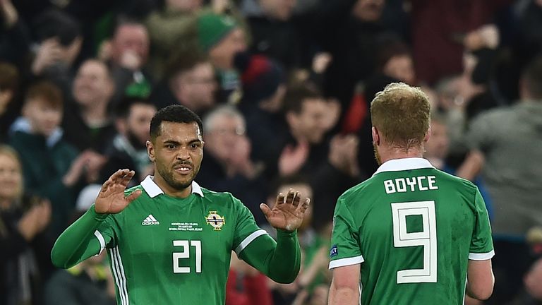 Josh Magennis of Northern Ireland (21) celebrates after scoring his team's second goal with Liam Boyce (9) during the 2020 UEFA European Championships Group C qualifying match between Northern Ireland and Belarus at Windsor Park on March 24, 2019 in Belfast, United Kingdom