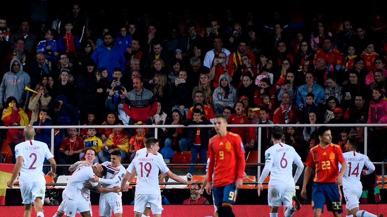 Joshua King celebrates his well-struck penalty to haul Norway level