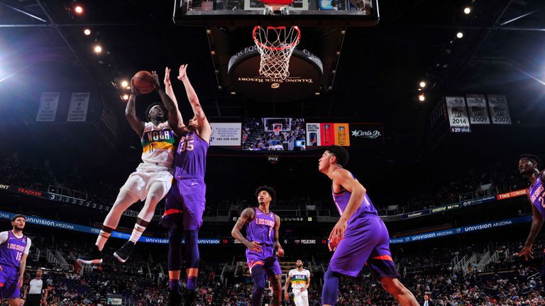 Jrue Holiday of the New Orleans Pelicans shoots the ball against the Phoenix Suns