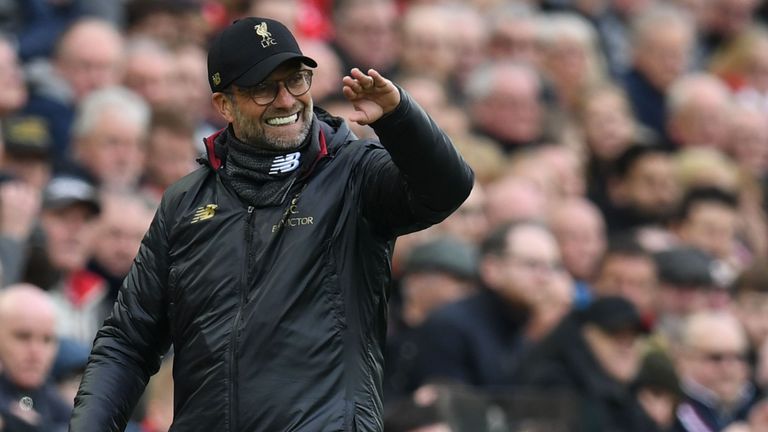Jurgen Klopp encourages his Liverpool team during the match with Tottenham