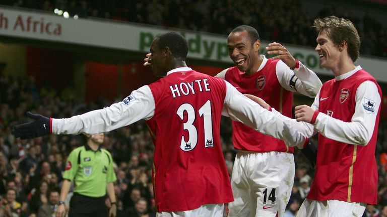 Justin Hoyte celebrates scoring for Arsenal against Charlton in 2007 as Thierry Henry looks on