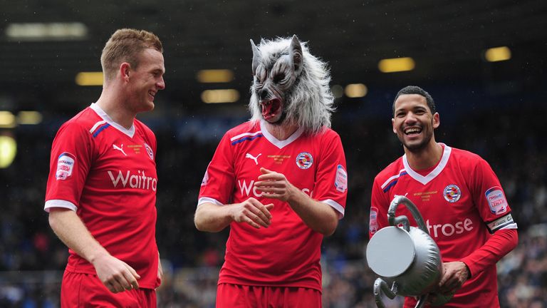 Reading players (L-R) Alex Pearce, Kaspars Gorkss and Jobi McAnuff celebrate after the npower Championship match against Birmingham City on April 28, 2012