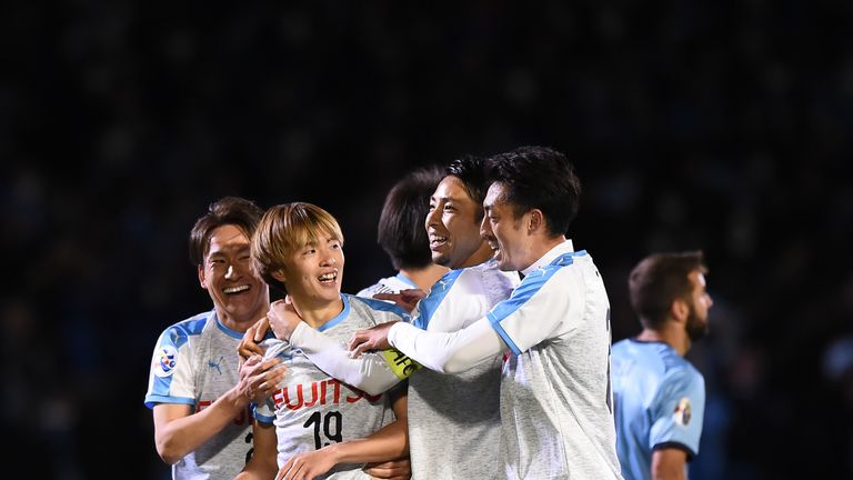 Manabu Saito #19 celebrates scoring for Kawasaki Frontale
