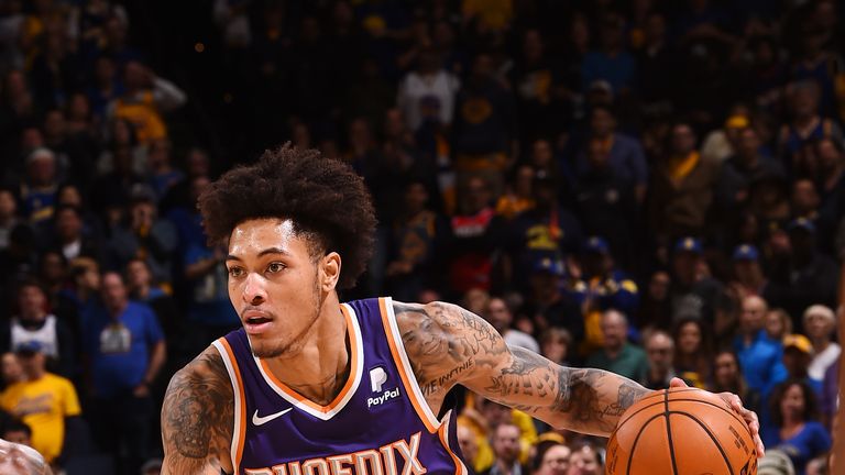 Kelly Oubre Jr. #3 of the Phoenix Suns handles the ball against the Golden State Warriors on March 10, 2019 at ORACLE Arena in Oakland, California.