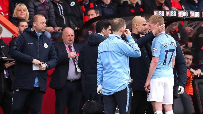 Kevin De Bruyne is consoled by Pep Guardiola after coming off injured