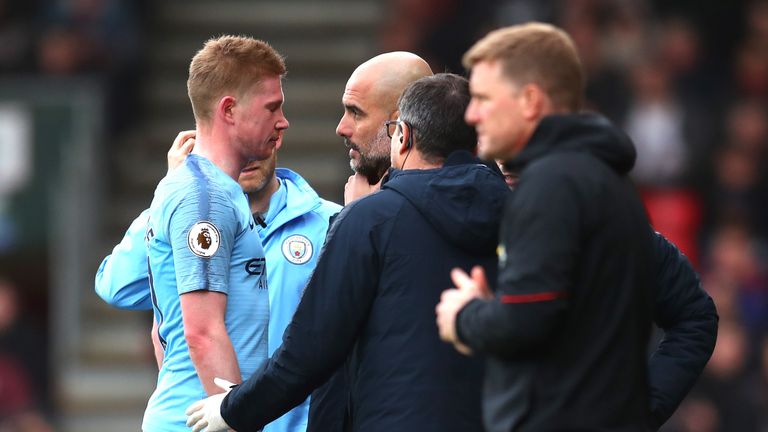 Kevin De Bruyne is consoled by Pep Guardiola after coming off injured