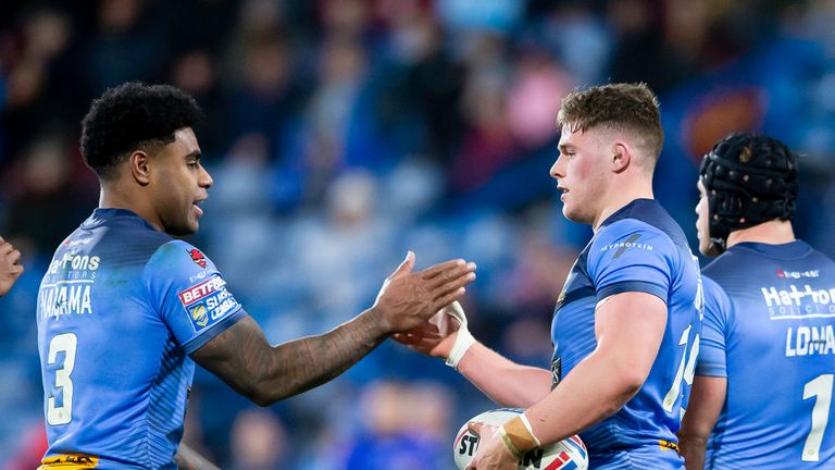 Picture by Allan McKenzie/SWpix.com - 14/03/2019 - Rugby League - Betfred Super League - Huddersfield Giants v St Helens - John Smith&#39;s Stadium, Huddersfield, England - St Helens&#39; Kevin Naiqama congratulates Morgan Knowles on his try against Huddersfield.