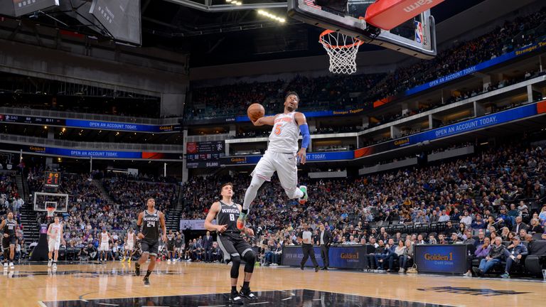 SACRAMENTO, CA - MARCH 4: Dennis Smith Jr. #5 of the New York Knicks dunks the ball during the game against the Sacramento Kings on March 4, 2019 at Golden 1 Center in Sacramento, California. NOTE TO USER: User expressly acknowledges and agrees that, by downloading and or using this Photograph, user is consenting to the terms and conditions of the Getty Images License Agreement. Mandatory Copyright Notice: Copyright 2019 NBAE (Photo by Rocky Widner/NBAE via Getty Images)