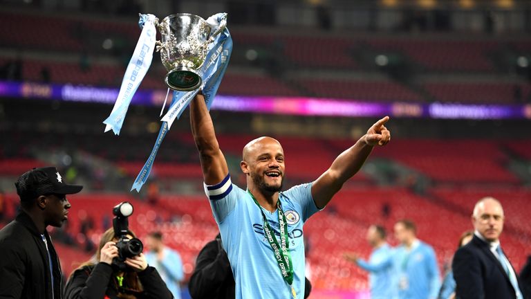 Kompany celebrates winning the League Cup final last month