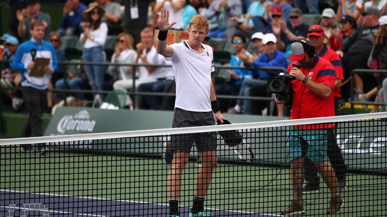 Kyle Edmund of Great Britain celebrates to the crowd after his straight sets victory against Nicolas Jarry of Chile during their men's singles second round match on day seven of the BNP Paribas Open at the Indian Wells Tennis Garden on March 10, 2019 in Indian Wells, California