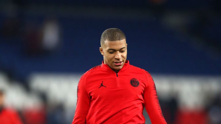 Kylian Mbappe warms up ahead of the Champions League last-16 second leg between PSG and Manchester United