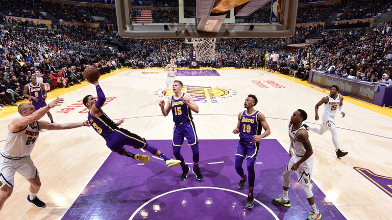 Josh Hart of the Los Angeles Lakers shoots the ball against the Denver Nuggets