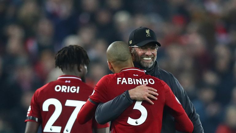 Jurgen Klopp celebrates with Fabinho after Liverpool's win over Watford at Anfield on February 27, 2019
